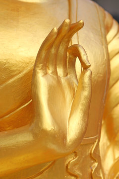 Hand Of Gold Buddha In Thailand.