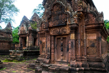 Naklejka premium Banteay Srei is built largely of red sandstone and is a 10th-century Cambodian temple dedicated to the Hindu god Shiva, Siem Reap, Cambodia