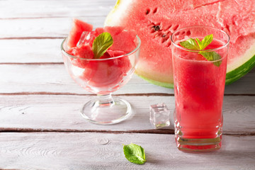 Watermelon smoothie with ice cube and mint