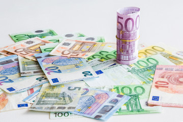 Euro paper money with five hundred banknote on the table. Dealing with money. Salary day.
