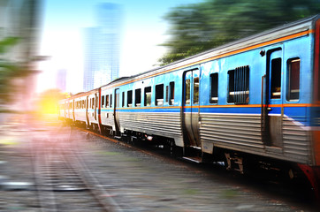 Fototapeta premium Trains running on the tracks in the evening 