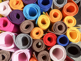 Close-up of rolls of colored paper