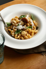 Pasta with mushrooms in white plate