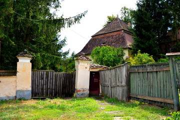 Typical rural landscape and peasant houses in  Dealu Frumos, Schoenberg, a village in Merghindeal commune in Sibiu County, Transylvania, Romania. 