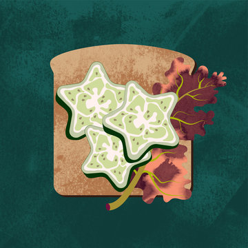 A sandwich with sallad and star shaped cucumbers