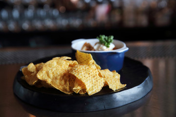 Nachos on dark tone , Mexican food