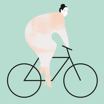 A woman wearing heals riding a bike