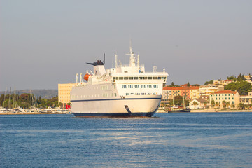 Fototapeta na wymiar Luxury Cruise Ship Sailing from Port.