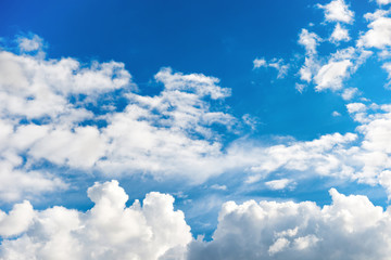 Naklejka premium White clouds on the blue sky