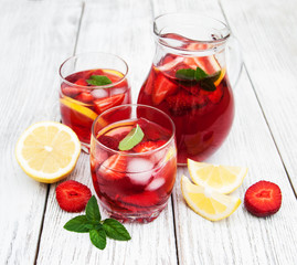 Glasses of lemonade with strawberries