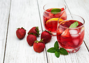 Glasses of lemonade with strawberries