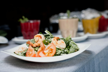 Salad with shrimps and tomato