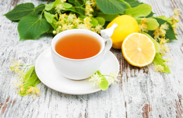 cup of herbal tea with linden flowers