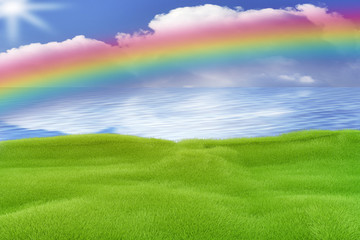 Obraz na płótnie Canvas Green area by the sea with rainbow