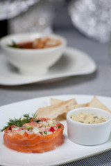 salad with seafood with salmon in the ring