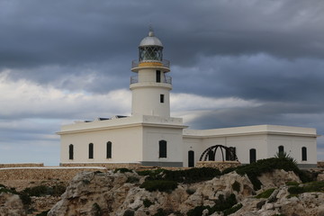 Fototapeta na wymiar Mediterranean lighthouse in Spain. Travel Europe. Wanderlust.
