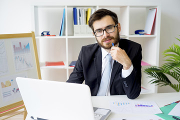 Fototapeta premium Businessman working in office