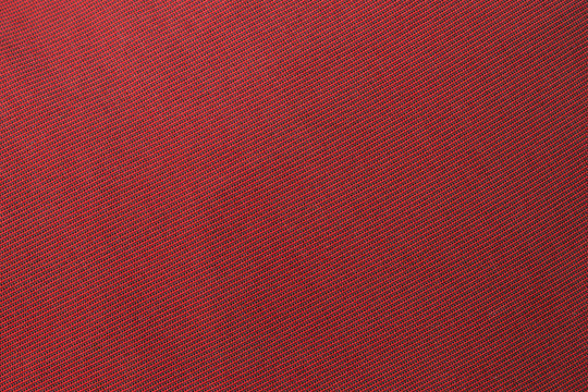 The red fabric texture background.