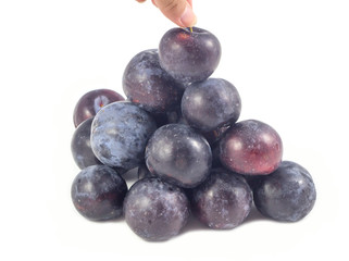 Sweet plum, prunes isolated on white background, Group of plums, prunes with leaf isolated on a white background. Fresh of plum, prunes fruit that helps in digestion, suitable for constipation.