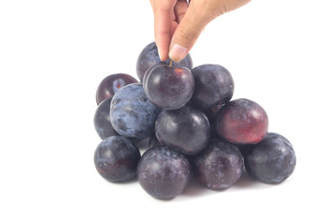 Sweet plum, prunes isolated on white background, Group of plums, prunes with leaf isolated on a white background. Fresh of plum, prunes fruit that helps in digestion, suitable for constipation.