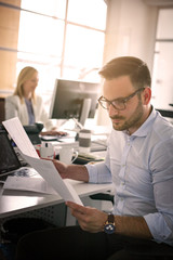 Business people working Business people together in office.