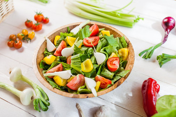 vegetable salad bowl on kitchen table, balanced diet