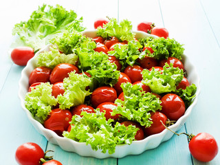 Baked tomatoes and greens