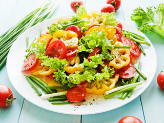 Red-yellow tomatoes salad