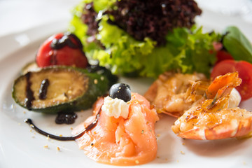 Dish of sea fish with spring vegetables
