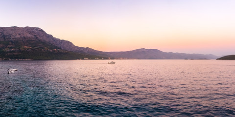 Fototapeta premium Beautiful Sunset Dusk Ocean Mountain Landscape in Croatia European Vacation Destination