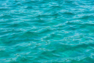 Fototapeta na wymiar Crystal Clear Mediterranean Water Beach Ocean Closeup Texture Landscape Natural Feature