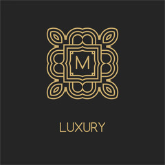 Vintage luxury emblem and logo. Abstract fashion ethnic print. Calligraphic flourishes. Black and gold vector ornament. Business sign