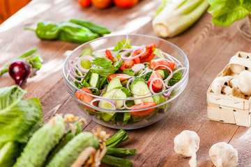 vegetable salad bowl on kitchen table, balanced diet