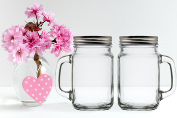 Floral mock-up of 2 mason jars with lids, perfect for businesses who sell decals and stickers, just overlay your designs