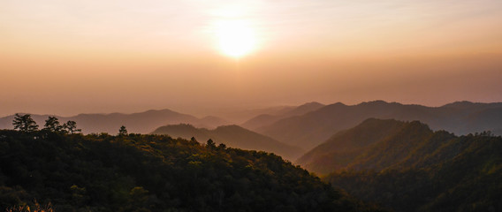 The panoramic scenery of Doi Chang mountain at sunset.