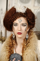 Portrait of a beautiful woman with fox collar