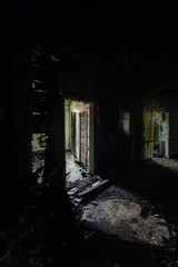 Dark Hallway with Open Doors - Abandoned Hospital & Nursing Home