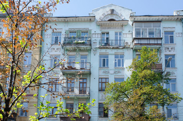 scene of old architecture and radiant trees, typical for Kiev, Ukraine, illuminated by the summer sun on a beautiful clear day