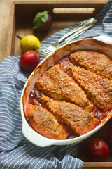 Cobbler with fruit filling, rustic style, selective focus
