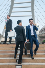 Asian business people action behavior walking running in rush hour.