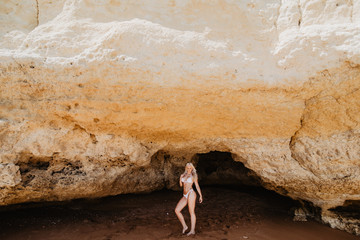 beautiful woman enjoy the summer beach time near ocean caves beach