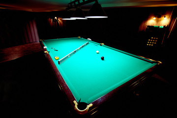 Serving a green billiard table before the game.
