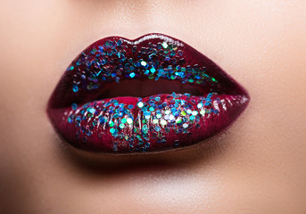 Beautiful female lips with magnificent make-up close-up.