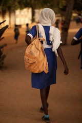 Gambian school girl with backpack with Gambia has decided sign