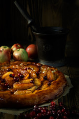 Apple pie tarte Tatin taken in low key - 168738514