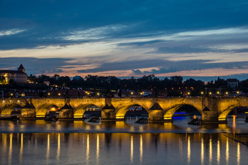 Fototapeta premium Night view on the Charles Bridge over the Vltava river in Prague, Czech Republic