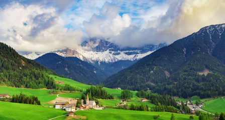Fototapeta na wymiar Beautiful mountain village landscape. Dolomites Alps, Italy