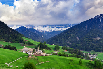 Fototapeta na wymiar Beautiful mountain village landscape. Dolomites Alps, Italy