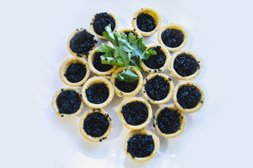 caviar in tartlets. Caviar black. - 168741195