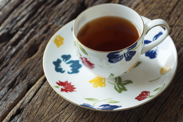 A cup of hot tea on the table